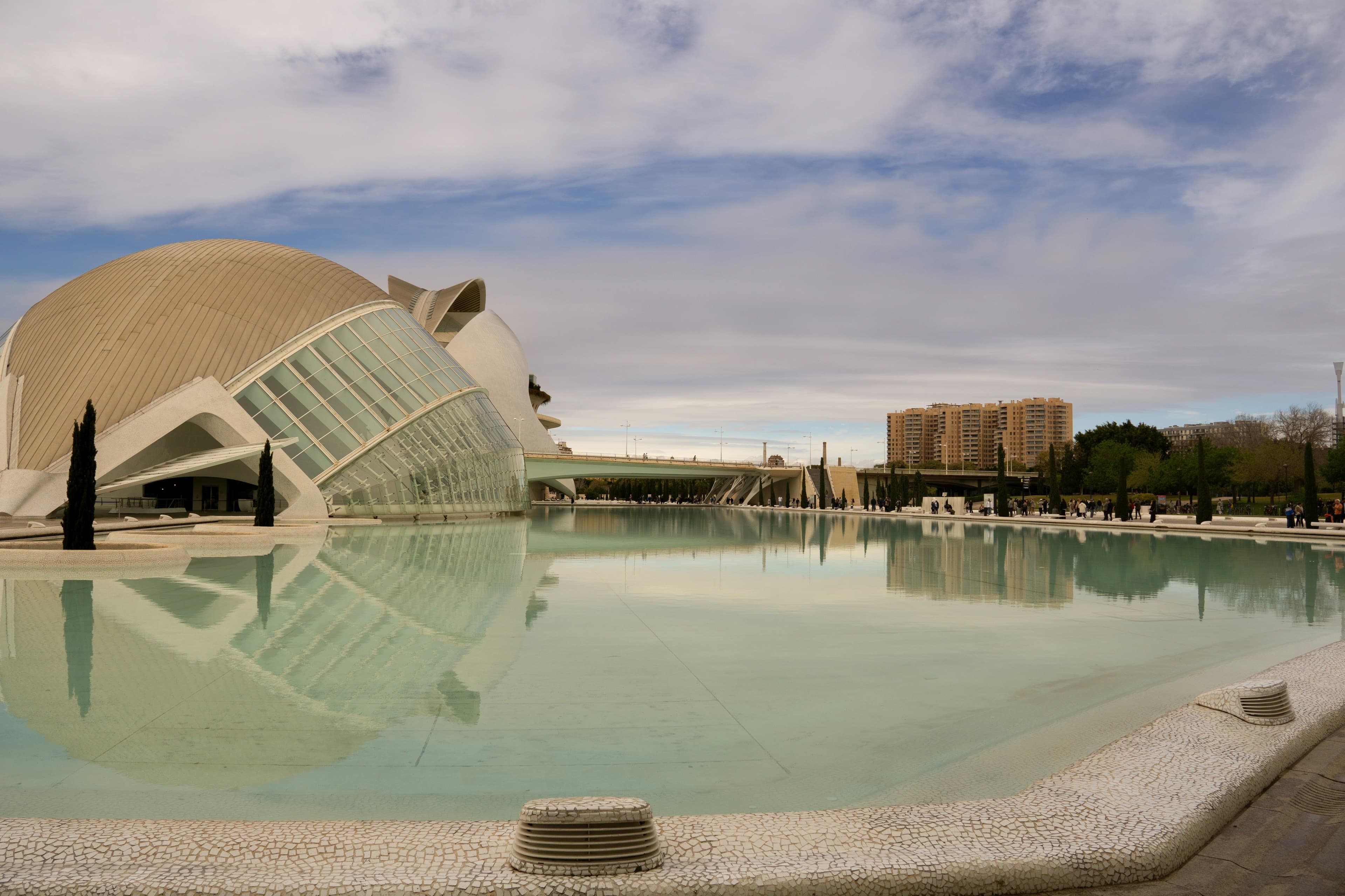 Valencia's City of Arts and Sciences — the white Calatrava-designed structures reflected in the turquoise pool.